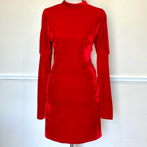 A red velvet mini dress with long sleeves. - Picture 2 of 3